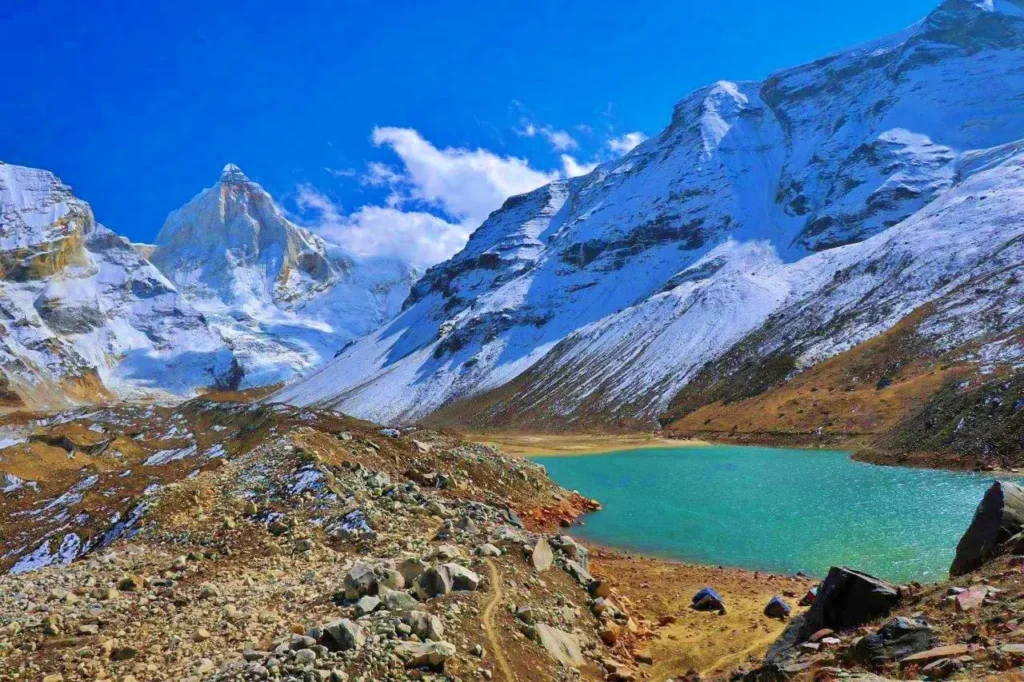 Trek to Kedartal, a stunning glacial lake near Gangotri in Uttarakhand. High-altitude, scenic, and less crowded.